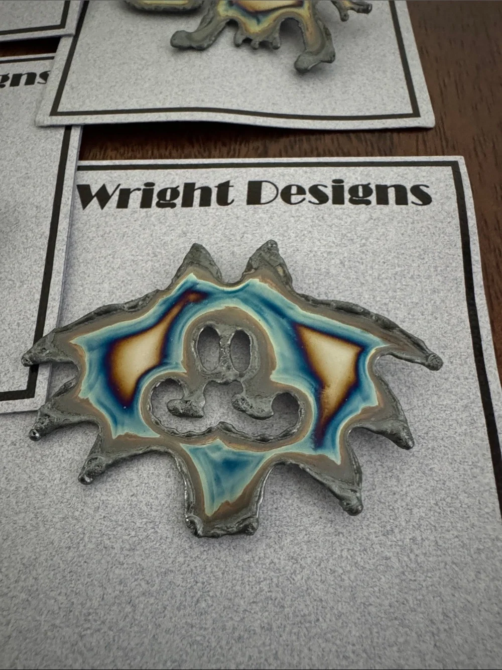 Brooches. Each piece is handcrafted. individually cut out of chrome plated steel